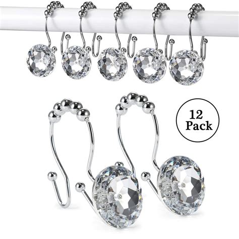 Only the hooks are seen and are usually decorative, and often match or compliment the curtain. . Shower curtain hooks decorative